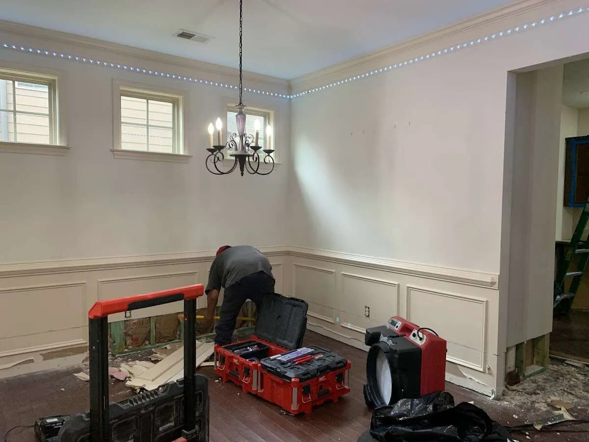 Restoration technician with professional equipment in Foxborough