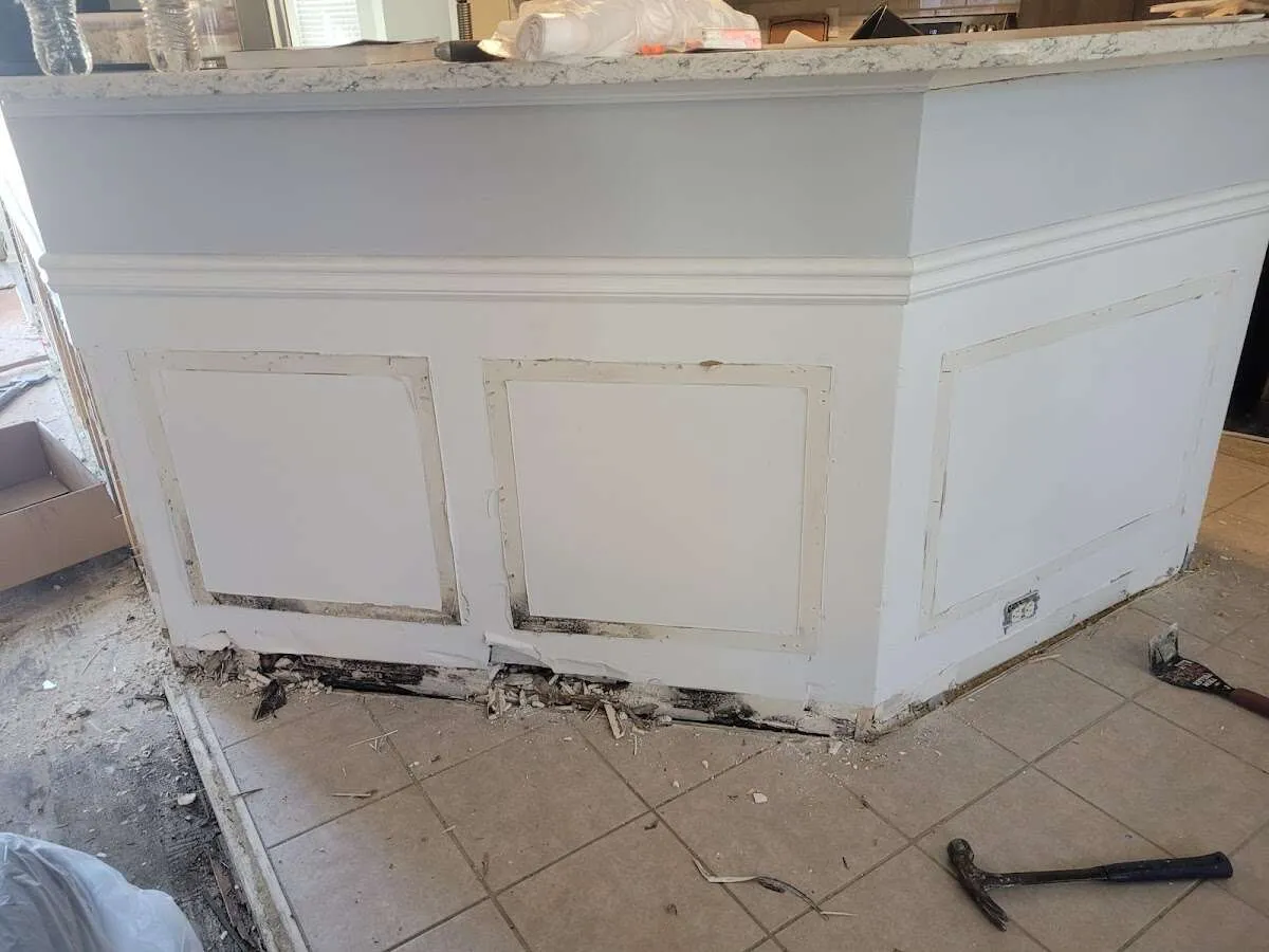 Water damage and mold on kitchen during Storm Damage Restoration in Foxborough